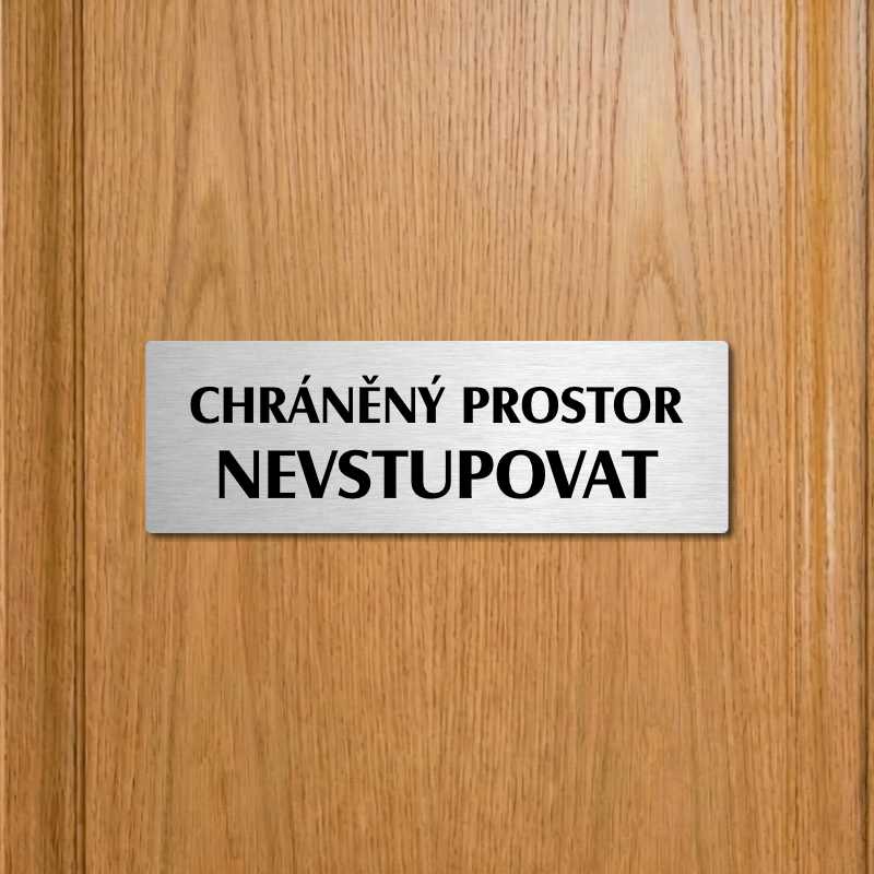 Chráněný prostor, 200x66mm, zlatá popiska s imitacemi šroubků